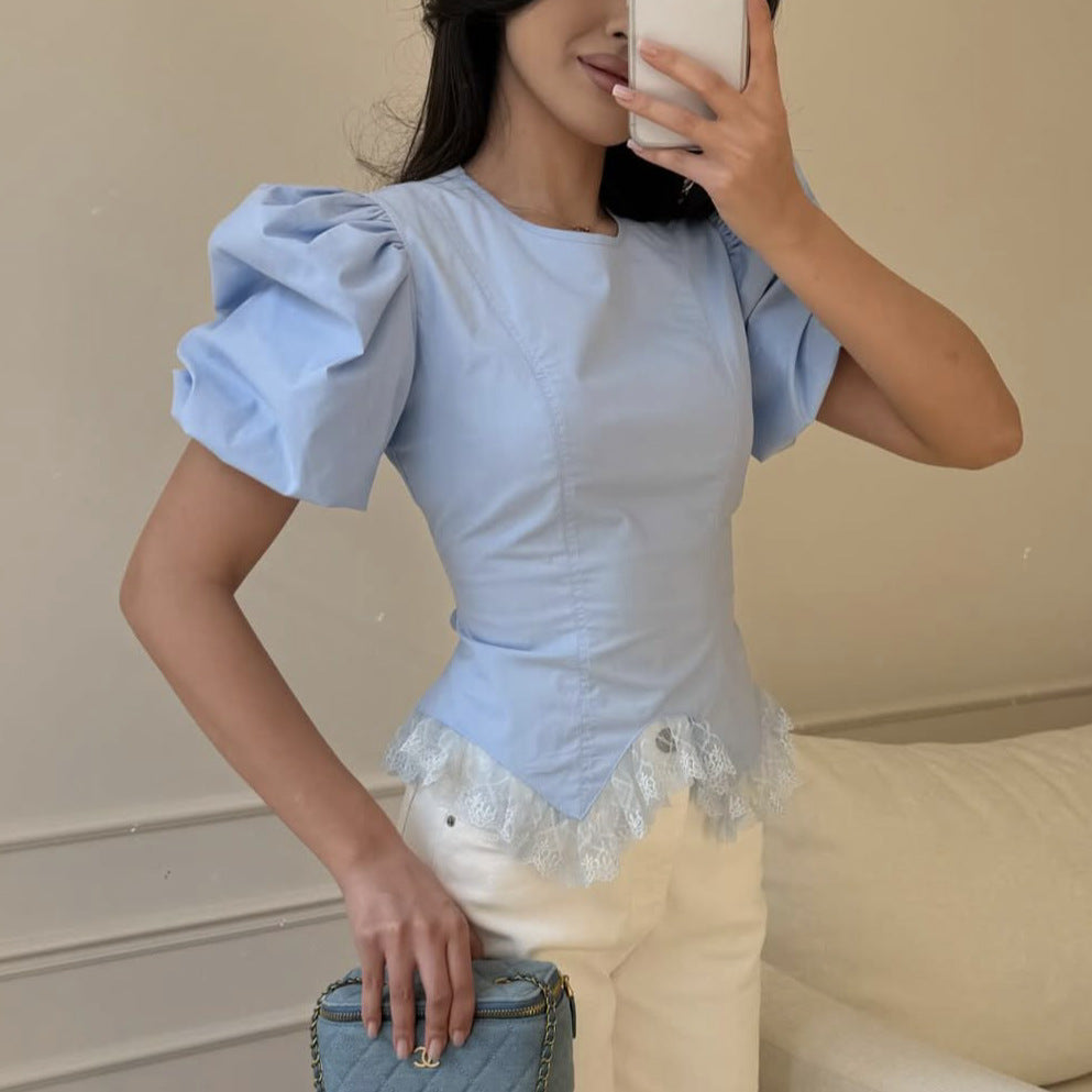 Verona peplum top with lace accents