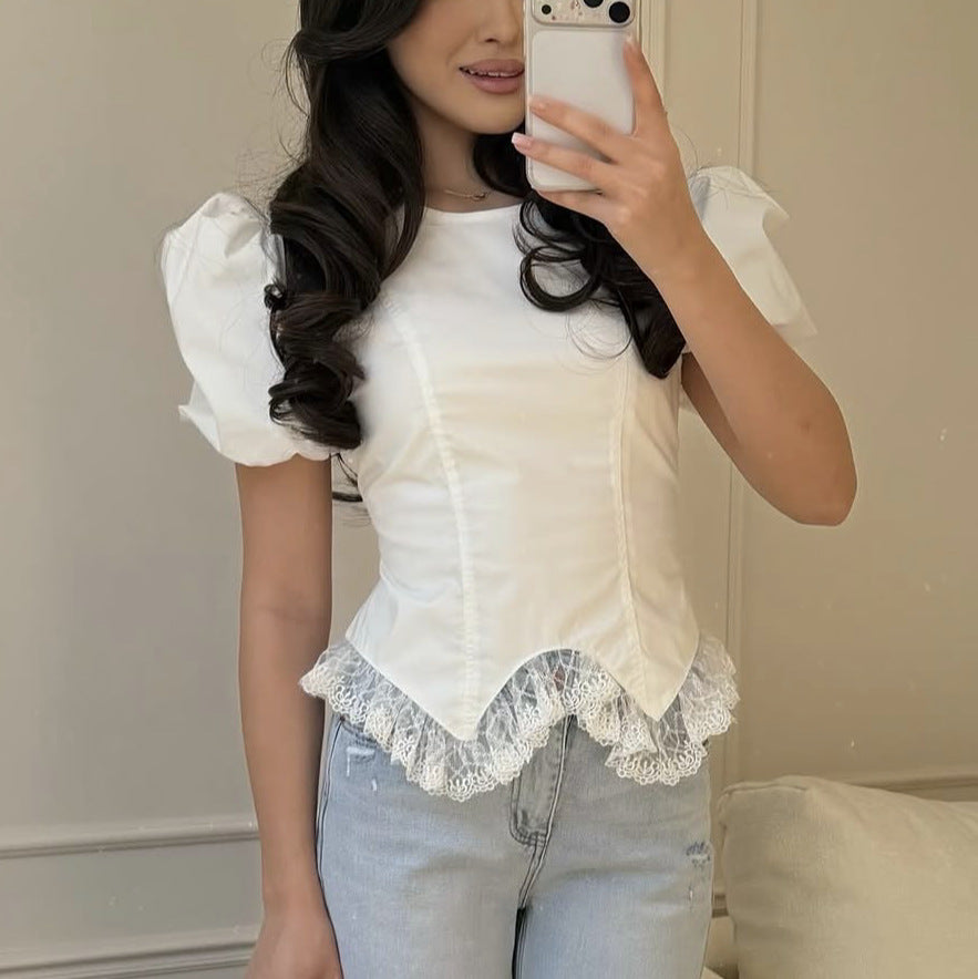 Verona peplum top with lace accents
