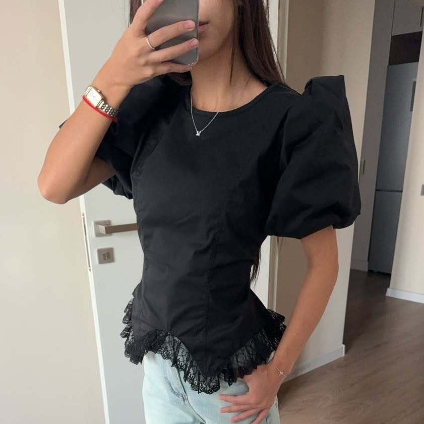 Verona peplum top with lace accents